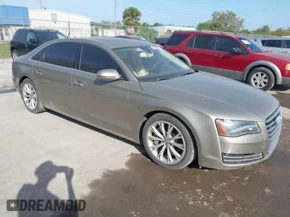 2012 Audi A8 z VIN WAURVAFD3CN024063, wystawiony jako IAAI lot #41706508 z przebiegiem Nie podano mil oraz . Historia ofert i sprzedaży dostępna na DreamBid. Obrazek 1.