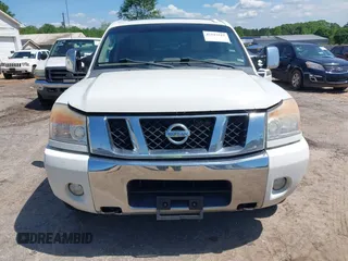 2010 Nissan Titan SE with VIN 1N6BA0ED4AN323907, listed as a IAAI auction lot 42113512 with 198,530 mi miles. Bid and sale history available at carsss.com. Image 13.