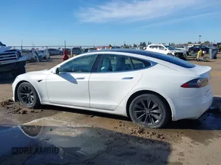 2018 Tesla Model S 75D z VIN 5YJSA1E29JF276329, wystawiony jako IAAI lot #41673653 z przebiegiem Nie podano mil oraz . Historia ofert i sprzedaży dostępna na DreamBid. Obrazek 14.
