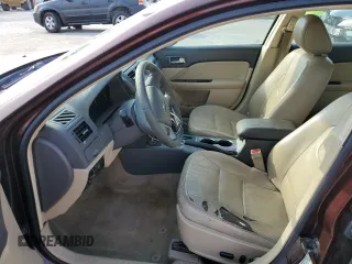 2012 Ford Fusion SEL with VIN 3FAHP0JAXCR149502, listed as a Copart auction lot 52433465 with 228,886 mi miles and Salvage Title. Bid and sale history available at DreamBid. Image 7.