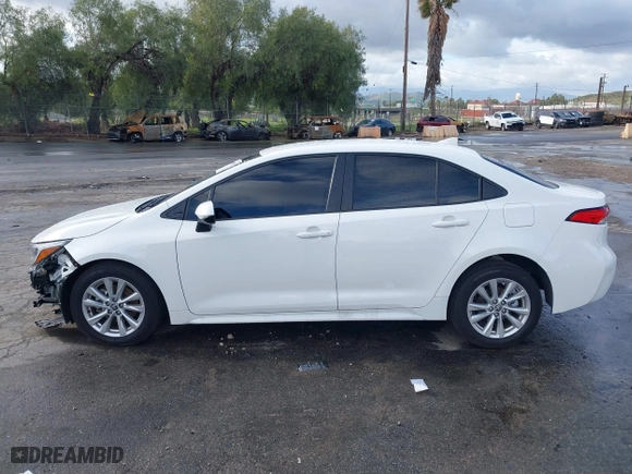 2024 Toyota Corolla Hybrid LE with VIN JTDBCMFE2R3061338, listed as a IAAI auction lot 41692872 with 21,783 mi miles. Bid and sale history available at carsss.com. Image 15.