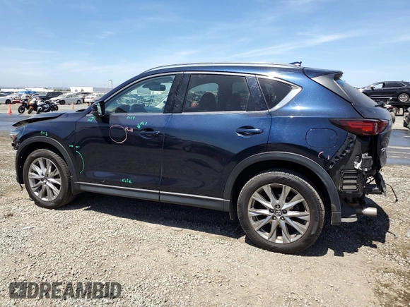 2020 Mazda CX-5 Grand Touring z VIN JM3KFADM4L0794765, wystawiony jako Copart lot #63850005 z przebiegiem 53 270 mil mil oraz Szkoda całkowita • Salvage title. Historia ofert i sprzedaży dostępna na DreamBid. Obrazek 2.