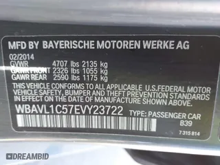 2014 BMW X1 xDrive28i with VIN WBAVL1C57EVY23722, listed as a IAAI auction lot 41839543 with 121,742 mi miles. Bid and sale history available at carsss.com. Image 9.