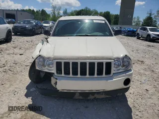 2005 Jeep Grand Cherokee Laredo with VIN 1J4GR48K05C625144, listed as a Copart auction lot 57477275 with 167,654 mi miles and Salvage title. Bid and sale history available at DreamBid. Image 5.