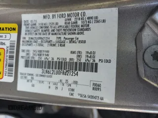 2015 Lincoln MKZ Hybrid with VIN 3LN6L2LU0FR621254, listed as a Copart auction lot 55275185 with 104,021 mi miles and Salvage Title. Bid and sale history available at DreamBid. Image 13.