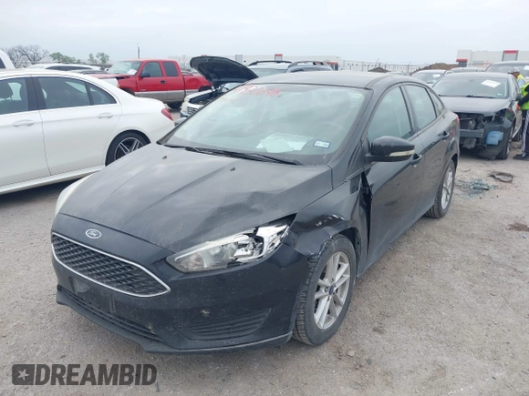 2016 Ford Focus SE with VIN 1FADP3F21GL305027, listed as a IAAI auction lot 41930646 with 106,127 mi miles and . Bid and sale history available at DreamBid. Image 2.