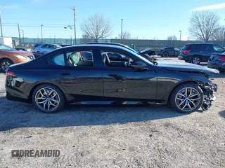 2024 BMW i5 eDrive40 with VIN WBY33FK00RCP37858, listed as a IAAI auction lot 41016747 with Not provided miles and . Bid and sale history available at DreamBid. Image 13.