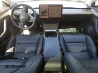 2023 Tesla Model 3 with VIN 5YJ3E1EA1PF664941, listed as a Copart auction lot 58097005 with 39,391 mi miles and Salvage title. Bid and sale history available at DreamBid. Image 8.