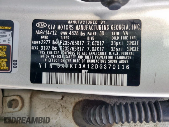 2013 Kia Sorento LX with VIN 5XYKT3A12DG370116, listed as a Copart auction lot 57598675 with 203,902 mi miles and Salvage title. Bid and sale history available at DreamBid. Image 14.