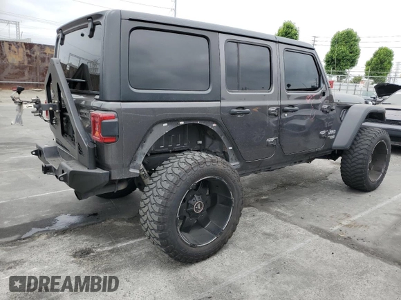 2019 Jeep Wrangler Unlimited Sport S with VIN 1C4HJXDG5KW535115, listed as a Copart auction lot 58404545 with 95,491 mi miles and Salvage title. Bid and sale history available at DreamBid. Image 3.