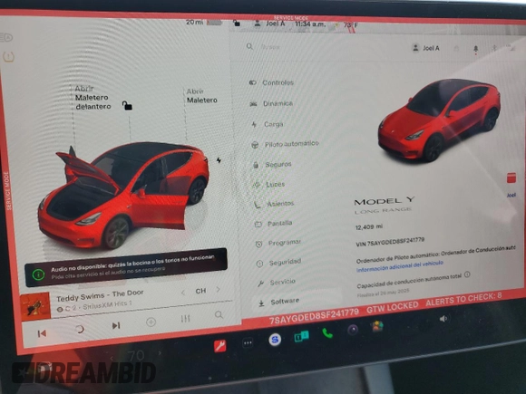 2025 Tesla Model Y Long Range with VIN 7SAYGDED8SF241779, listed as a Copart auction lot 51899205 with 12,409 mi miles and Salvage Title. Bid and sale history available at DreamBid. Image 9.