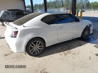 2014 Scion tC with VIN JTKJF5C7XE3073478, listed as a IAAI auction lot 42058385 with 151,491 mi miles. Bid and sale history available at carsss.com. Image 4.