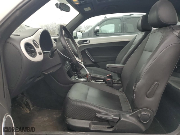 2013 Volkswagen Beetle Coupe 2.5L with VIN 3VWJX7AT7DM614139, listed as a Copart auction lot 78745604 with 201,620 mi miles and Salvage Title. Bid and sale history available at carsss.com. Image 7.