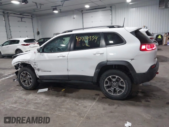 2021 Jeep Cherokee Trailhawk with VIN 1C4PJMBX8MD139644, listed as a IAAI auction lot 42419334 with 68,333 mi miles and . Bid and sale history available at DreamBid. Image 14.