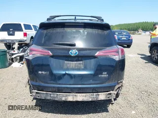 2018 Toyota RAV4 Hybrid SE with VIN JTMJJREV9JD191552, listed as a IAAI auction lot 42158665 with 84,025 mi miles and . Bid and sale history available at DreamBid. Image 16.