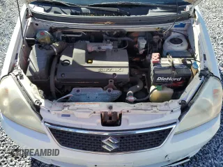 2007 Suzuki Aerio S z VIN JS2RA62S975353328, wystawiony jako Copart lot #87390384 z przebiegiem 92 347 mil mil oraz Szkoda całkowita • Salvage title. Historia ofert i sprzedaży dostępna na DreamBid. Obrazek 11.