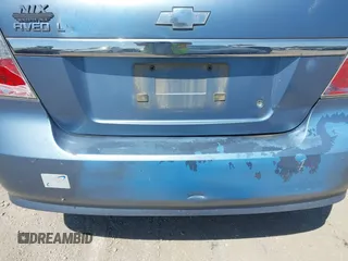 2007 Chevrolet Aveo LS with VIN KL1TD56667B122930, listed as a IAAI auction lot 42802302 with 97,365 mi miles and . Bid and sale history available at DreamBid. Image 6.