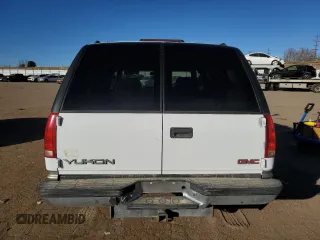 1999 GMC Denali z VIN 1GKEK13R5XR503159, wystawiony jako Copart lot #89018655 z przebiegiem 229 819 mil mil oraz Czysty tytuł • Clean title. Historia ofert i sprzedaży dostępna na DreamBid. Obrazek 6.