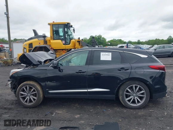 2019 Acura RDX Technology with VIN 5J8TC2H52KL030992, listed as a IAAI auction lot 42459982 with 77,042 mi miles and . Bid and sale history available at DreamBid. Image 14.