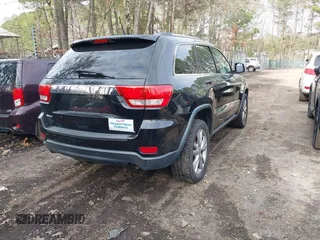 2012 Jeep Grand Cherokee Laredo with VIN 1C4RJEAG0CC316823, listed as a IAAI auction lot 41846479 with 215,317 mi miles. Bid and sale history available at carsss.com. Image 4.