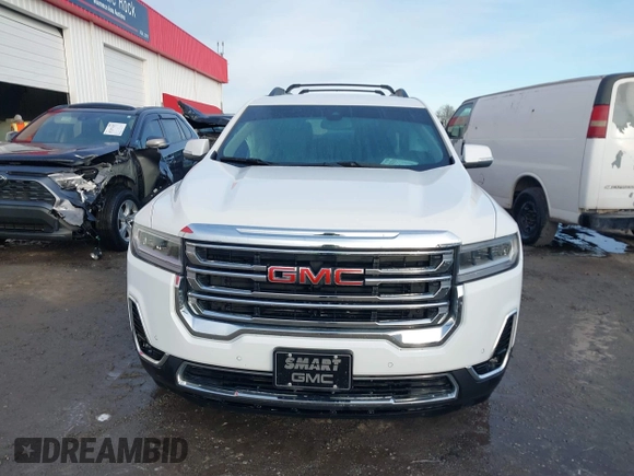 2023 GMC Acadia SLT with VIN 1GKKNMLS0PZ212549, listed as a IAAI auction lot 41371189 with 26,805 mi miles and . Bid and sale history available at DreamBid. Image 12.