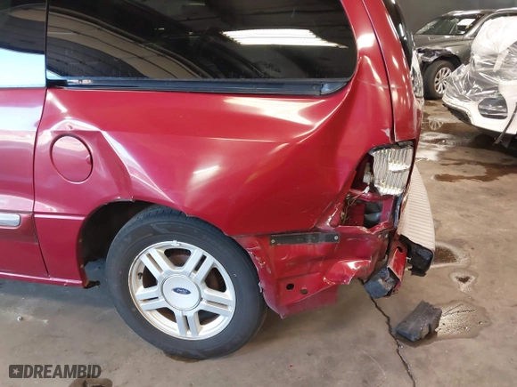 2002 Ford Windstar Wagon SE with VIN 2FMZA52442BB60882, listed as a IAAI auction lot 41621529 with 136,753 mi miles. Bid and sale history available at carsss.com. Image 6.