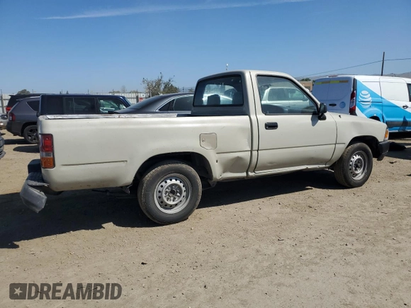 1992 Toyota Pickup z VIN JT4RN81A1N0094217, wystawiony jako Copart lot #56062545 z przebiegiem 242 256 mil mil oraz Szkoda całkowita • Salvage title. Historia ofert i sprzedaży dostępna na DreamBid. Obrazek 3.
