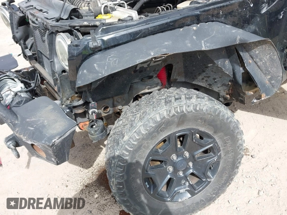 2014 Jeep Wrangler Sahara with VIN 1C4AJWBG9EL311477, listed as a IAAI auction lot 41884255 with 82,221 mi miles and . Bid and sale history available at carsss.com. Image 6.