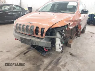 2015 Jeep Cherokee Trailhawk with VIN 1C4PJMBS5FW524462, listed as a IAAI auction lot 41774347 with 107,592 mi miles. Bid and sale history available at carsss.com. Image 6.