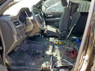 2023 Chevrolet Tahoe Commercial with VIN 1GNSCLEDXPR447042, listed as a Copart auction lot 52399275 with 22,205 mi miles and Salvage title. Bid and sale history available at DreamBid. Image 7.