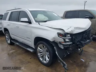 2018 Chevrolet Tahoe LT with VIN 1GNSCBKC5JR323595, listed as a IAAI auction lot 41550552 with 115,697 mi miles. Bid and sale history available at carsss.com. Image 1.