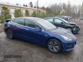 2018 Tesla Model 3 Long Range Battery with VIN 5YJ3E1EA9JF022782, listed as a IAAI auction lot 41875429 with 79,209 mi miles. Bid and sale history available at carsss.com. Image 1.