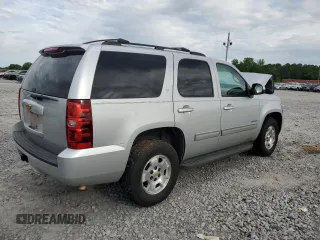 2014 Chevrolet Tahoe LT with VIN 1GNSCBE0XER117275, listed as a Copart auction lot 55858125 with 163,061 mi miles and Salvage title. Bid and sale history available at DreamBid. Image 3.