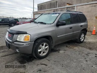 2006 GMC Envoy SLT with VIN 1GKDT13S462107498, listed as a Copart auction lot 83402454 with 311,039 mi miles and Salvage Title. Bid and sale history available at carsss.com. Image 1.