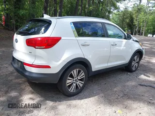 2014 Kia Sportage EX with VIN KNDPCCAC5E7658993, listed as a IAAI auction lot 42679549 with 107,658 mi miles and . Bid and sale history available at DreamBid. Image 4.