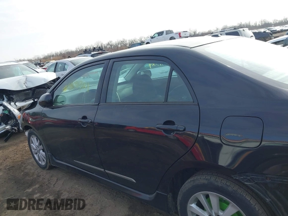 2009 Toyota Corolla with VIN 2T1BU40E29C124161, listed as a IAAI auction lot 41091324 with 128,310 mi miles. Bid and sale history available at carsss.com. Image 14.