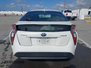 2016 Toyota Prius Four with VIN JTDKARFU7G3013485, listed as a IAAI auction lot 41954277 with 130,336 mi miles. Bid and sale history available at carsss.com. Image 16.