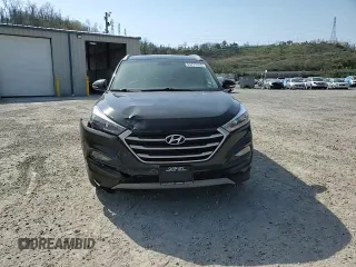 2018 Hyundai Tucson Sport z VIN KM8J3CAL6JU817677, wystawiony jako Copart lot #53757355 z przebiegiem 91 366 mil mil oraz Szkoda całkowita • Salvage title. Historia ofert i sprzedaży dostępna na DreamBid. Obrazek 14.
