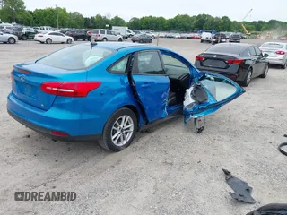 2015 Ford Focus SE z VIN 1FADP3F26FL252212, wystawiony jako IAAI lot #42345763 z przebiegiem 102 549 mil mil oraz . Historia ofert i sprzedaży dostępna na DreamBid. Obrazek 4.