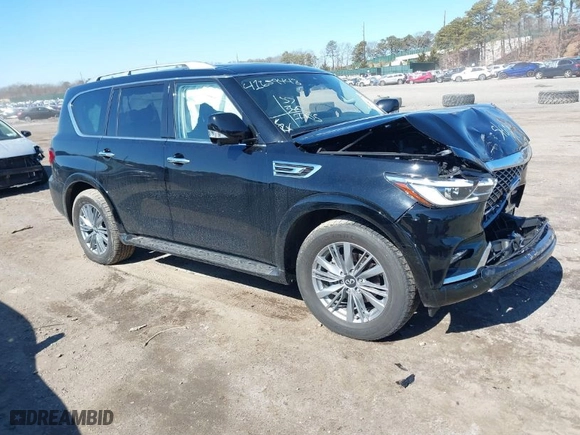 2023 Infiniti QX80 LUXE with VIN JN8AZ2AE3P9303090, listed as a IAAI auction lot 41659443 with 27,699 mi miles. Bid and sale history available at carsss.com. Image 1.