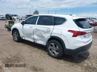 2023 Hyundai Santa Fe SE with VIN 5NMS14AJ9PH630176, listed as a IAAI auction lot 42202536 with 26,624 mi miles and . Bid and sale history available at DreamBid. Image 3.