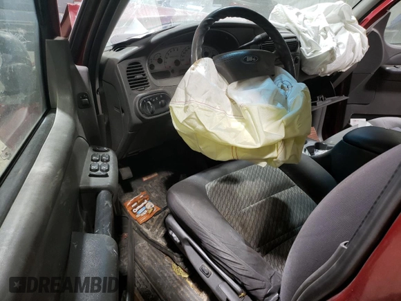 2005 Ford Explorer Sport Trac XLS with VIN 1FMZU77KX5UA12440, listed as a Copart auction lot 42966185 with 209,959 mi miles and Salvage title. Bid and sale history available at DreamBid. Image 8.