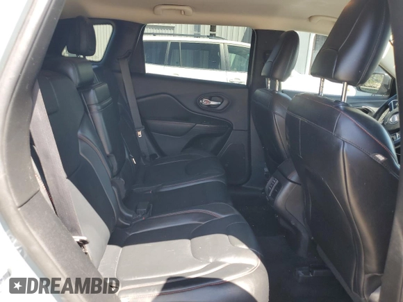2014 Jeep Cherokee Trailhawk z VIN 1C4PJMBBXEW134939, wystawiony jako Copart lot #56579125 z przebiegiem 155 693 mil mil oraz Czysty tytuł • Clean title. Historia ofert i sprzedaży dostępna na DreamBid. Obrazek 11.
