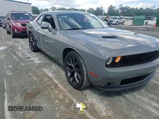 2019 Dodge Challenger SXT z VIN 2C3CDZAG5KH604003, wystawiony jako Copart lot #56694895 z przebiegiem 63 409 mil mil oraz Szkoda całkowita • Salvage title. Historia ofert i sprzedaży dostępna na DreamBid. Obrazek 13.