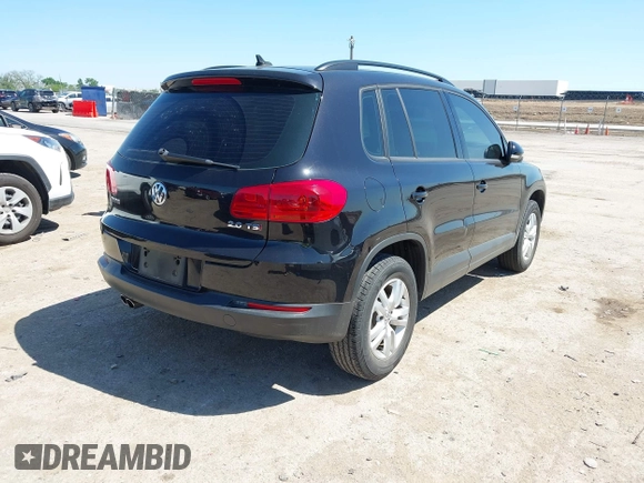 2015 Volkswagen Tiguan SE with VIN WVGAV7AX1FW558855, listed as a IAAI auction lot 42064427 with 58,584 mi miles and . Bid and sale history available at DreamBid. Image 4.