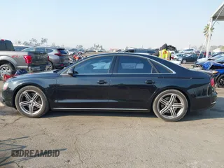 2011 Audi A8 with VIN WAUAVAFD6BN023937, listed as a IAAI auction lot 41288464 with 158,127 mi miles and . Bid and sale history available at DreamBid. Image 14.