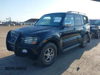 2001 Mitsubishi Montero Limited z VIN JA4MW51R61J034539, wystawiony jako IAAI lot #42336255 z przebiegiem 266 938 mil mil oraz . Historia ofert i sprzedaży dostępna na DreamBid. Obrazek 2.