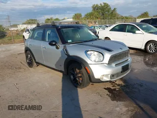 2013 MINI Countryman S ALL4 with VIN WMWZC5C59DWP33263, listed as a IAAI auction lot 41654506 with 127,226 mi miles and . Bid and sale history available at DreamBid. Image 1.