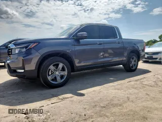2023 Honda Ridgeline RTL with VIN 5FPYK3F5XPB025508, listed as a Copart auction lot 64200695 with 3,913 mi miles and Salvage title. Bid and sale history available at DreamBid. Image 1.