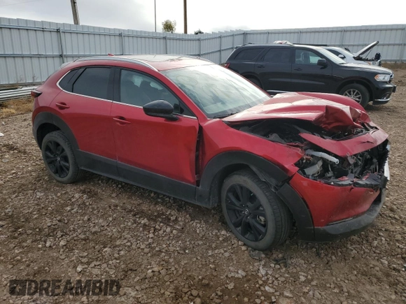 2021 Mazda CX-30 Premium with VIN 3MVDMBDY8MM248161, listed as a Copart auction lot 79176964 with 58,106 mi miles and Salvage Title. Bid and sale history available at carsss.com. Image 4.